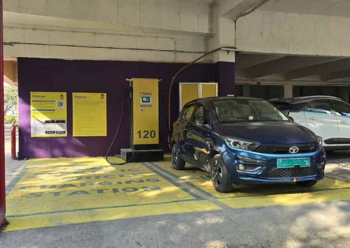 120 kW EV fast charging station installed in a covered parking area with an electric car charging